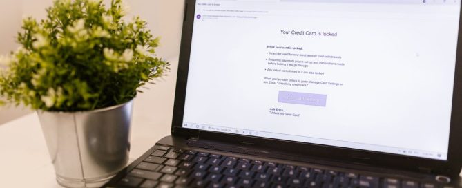 Suspicious phishing email displayed on a laptop screen
