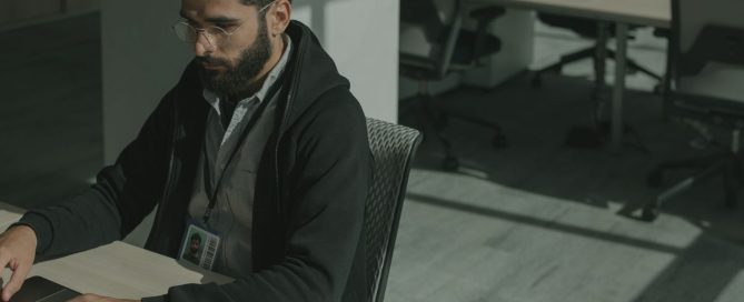 Office staff learning computer security tips together