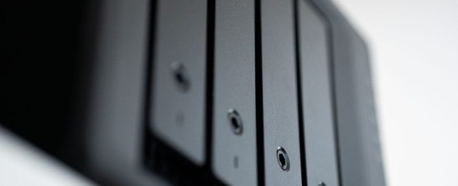 Cloud backup and external hard drive side by side